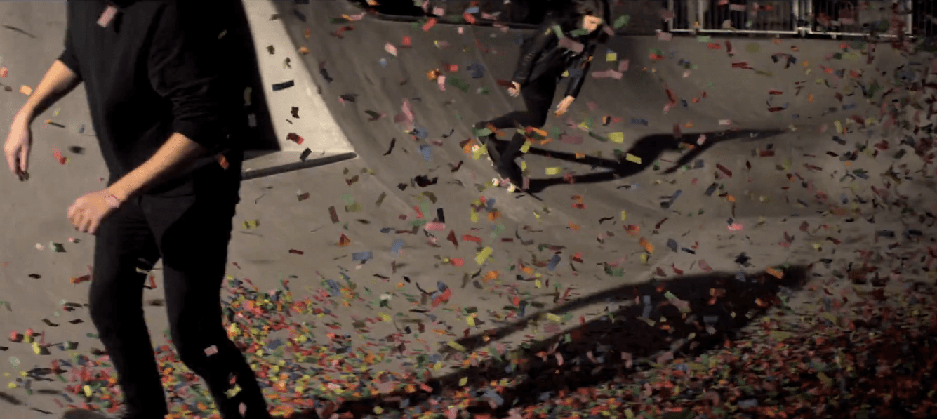 Jamie xx and Romy Madley Croft skate through confetti in ‘Loud Places’ video