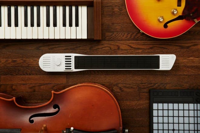 A MIDI controller that can be played like a guitar, piano, violin, drum or bass is funded on Kickstarter