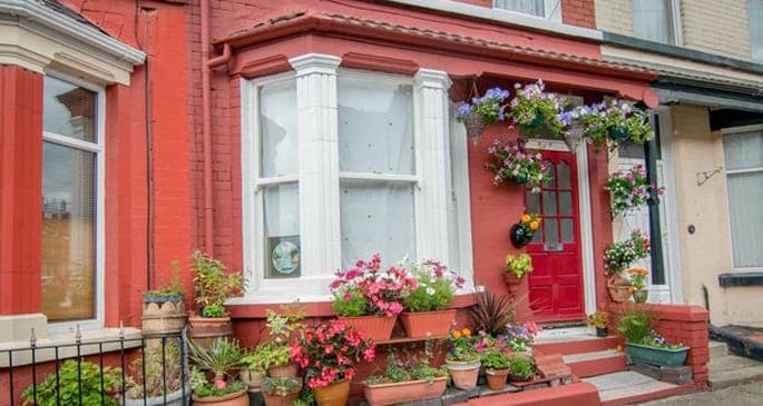 John Lennon’s childhood home sold at auction