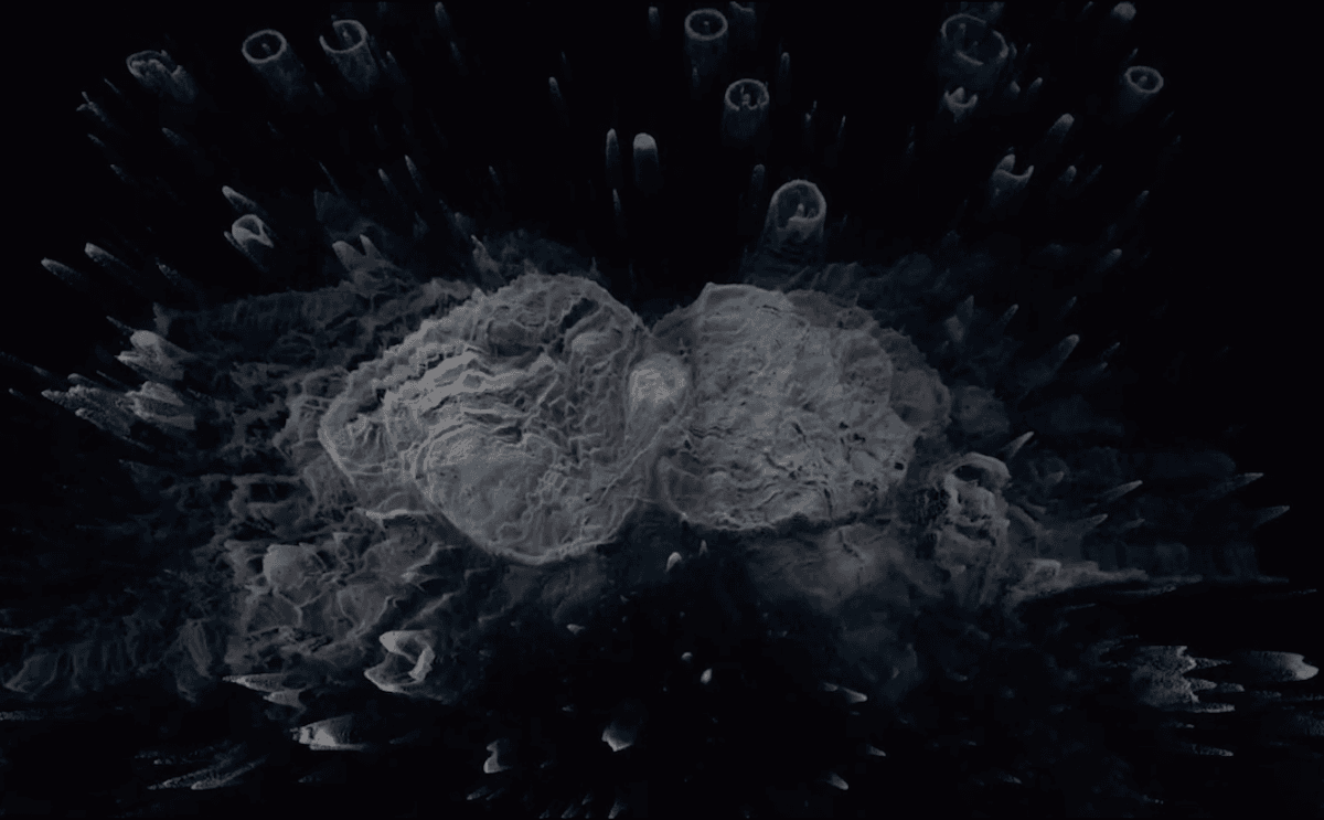 Screenshot from CAO video showing abstract shapes in dark landscape