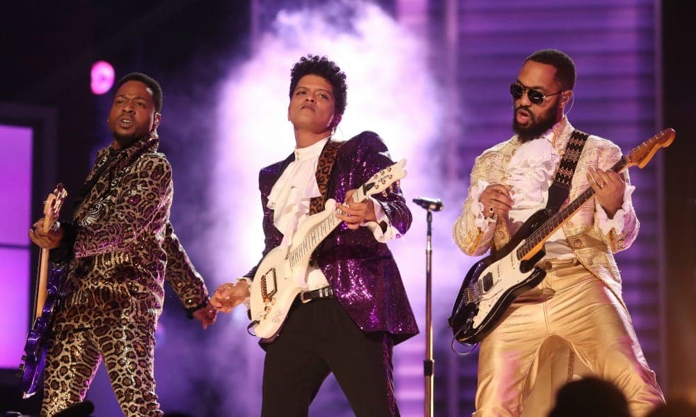Bruno Mars honors Prince with guitar-shredding Grammys performance of ‘Let’s Go Crazy’ – watch