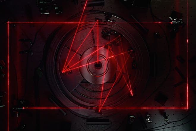 Watch a laser light show inside a CD player in the video for Rob Clouth's 'Islands of Glass'