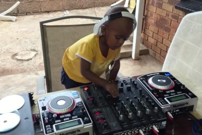 Watch a two-year-old DJ play tunes like a professional