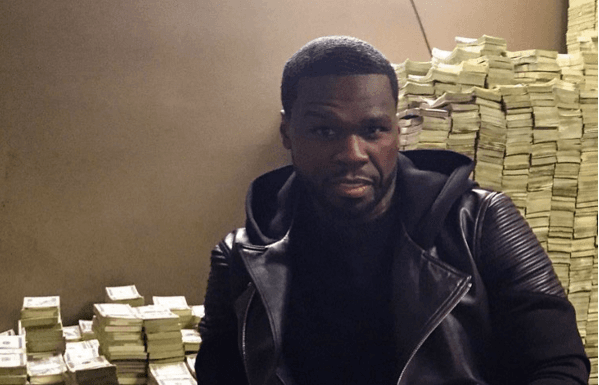50 Cent posed with fake cash and lied about owning African mansion, court hears