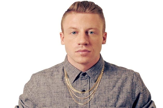 Macklemore has a painting of a naked Justin Bieber in his studio