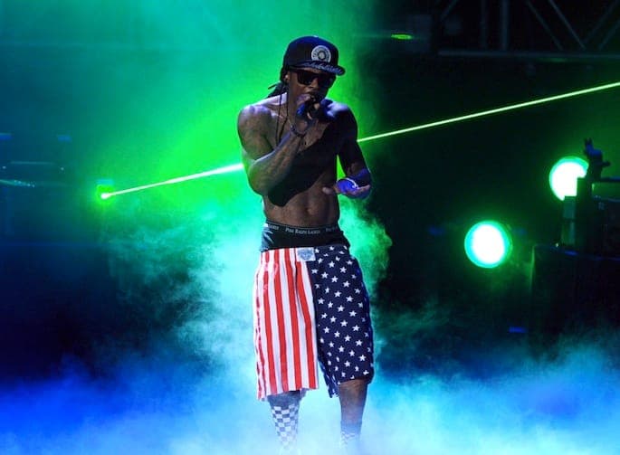 Lil Wayne steps on American flag during 'God Bless Amerika' video shoot