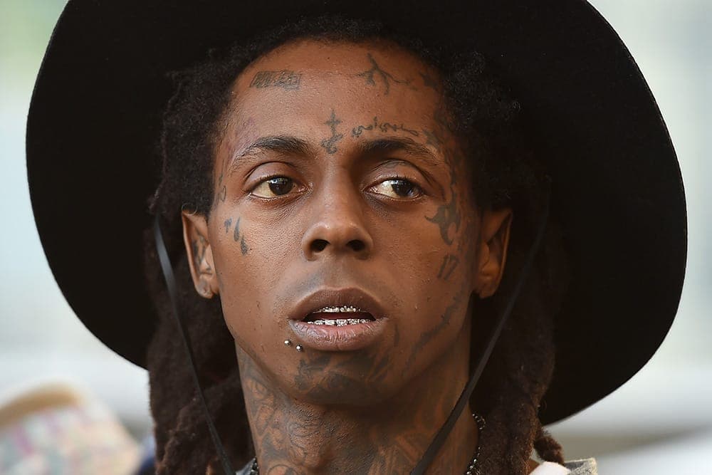 Lil Wayne denies reports of another seizure after concert cancelation