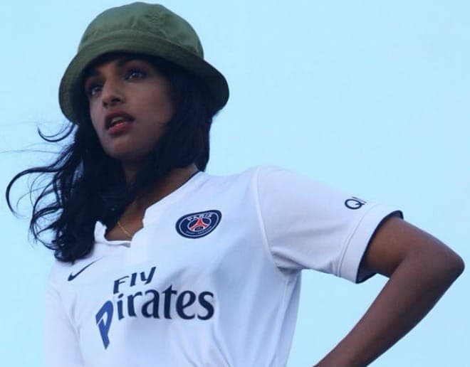 M.I.A. attacked by Paris Saint Germain for wearing football strip in 'Borders' video