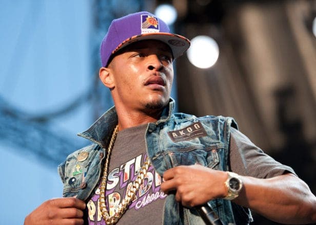 Two people injured in the T.I. concert shooting this summer are suing Live Nation
