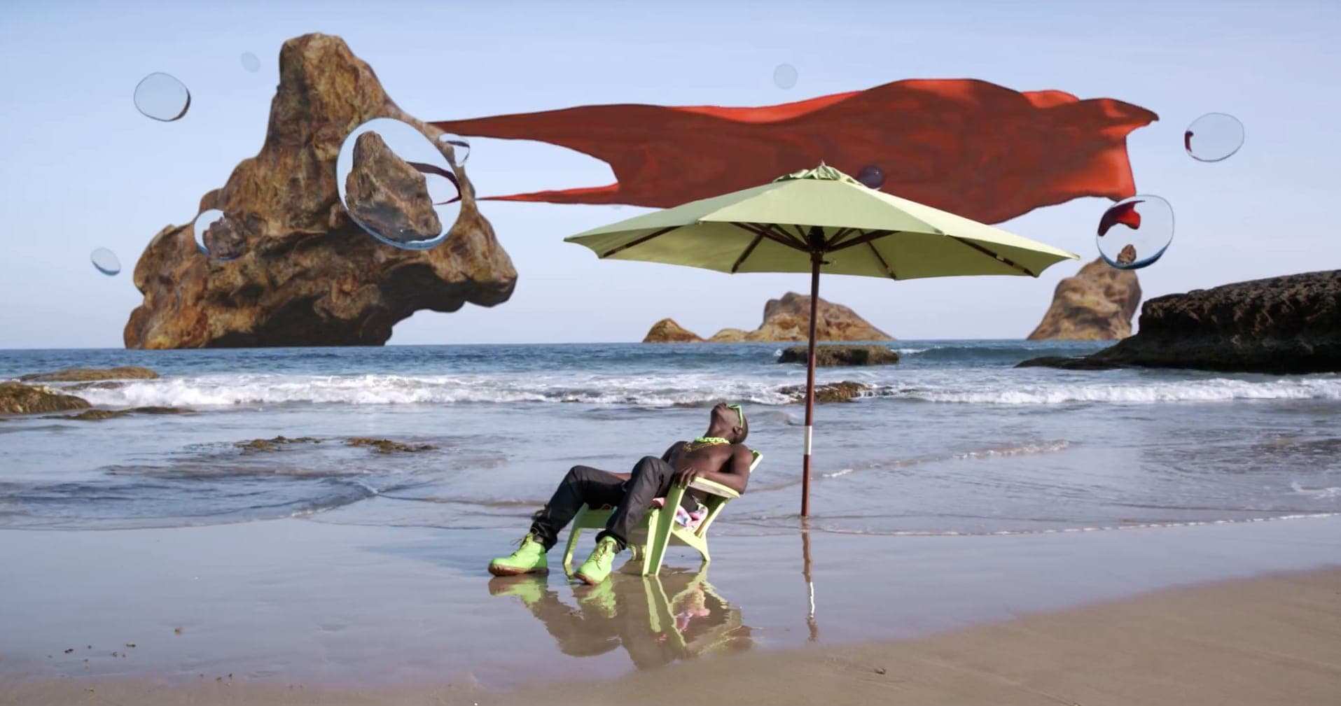 Watch Le1f's neon video for the SOPHIE-produced 'Koi'