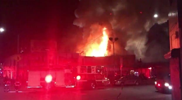 At least nine people dead and 25 missing after fire breaks out at 100% Silk warehouse party in Oakland