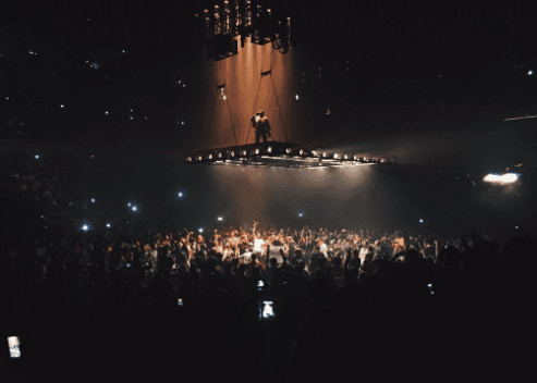 Kanye West fan attempts to climb floating stage in Atlanta