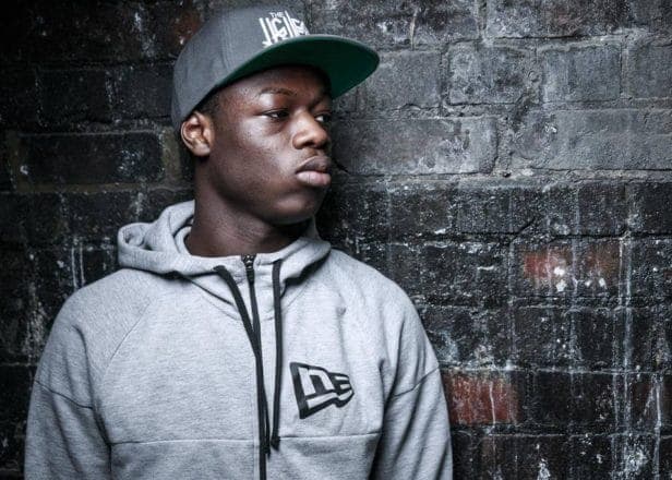 Watch J Hus rap ‘Lean & Bop’ with a kid recovering from brain surgery