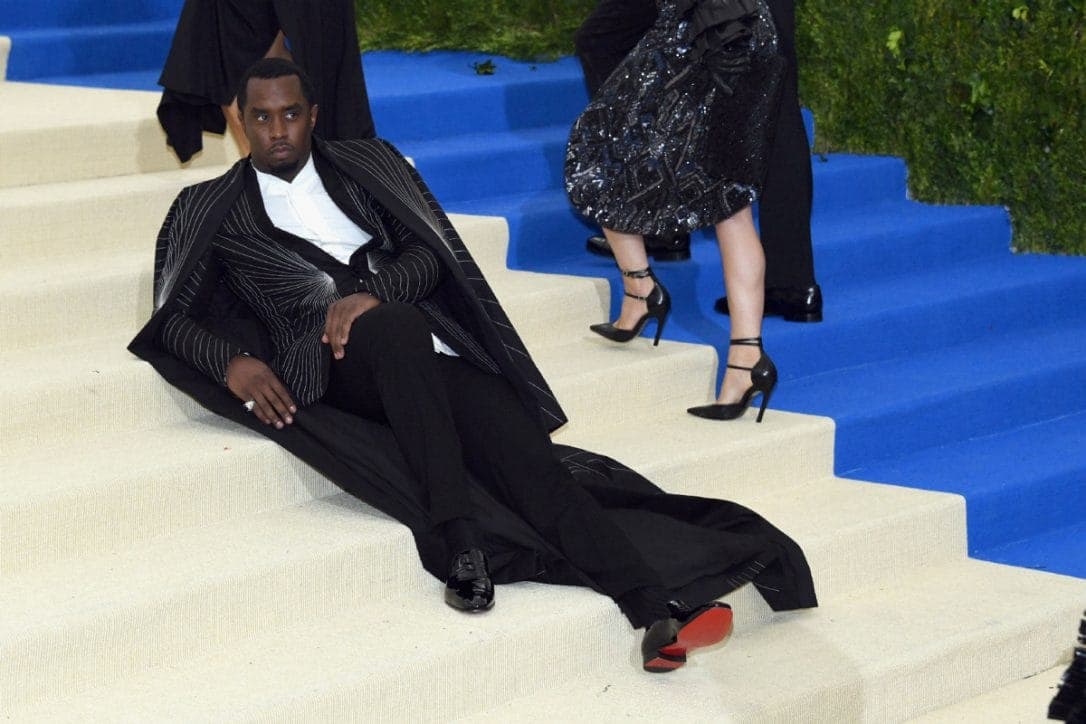 Diddy "got tired" at the Met Gala so he lay down on the stairs in his floor-length cape