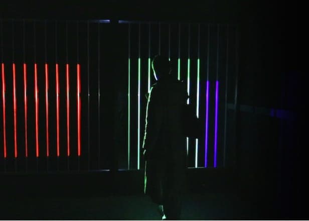 Watch a room-sized illuminated "light harp" in action
