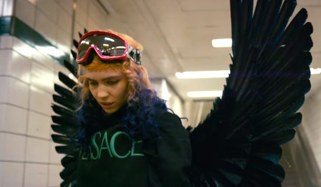 Grimes throws a blood rave in ‘Kill V. Maim’ video