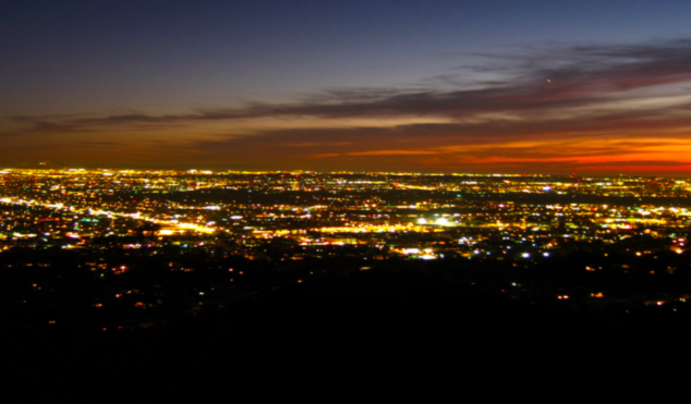 Why is this website mixing ambient music with police scanner audio so intensely gripping?