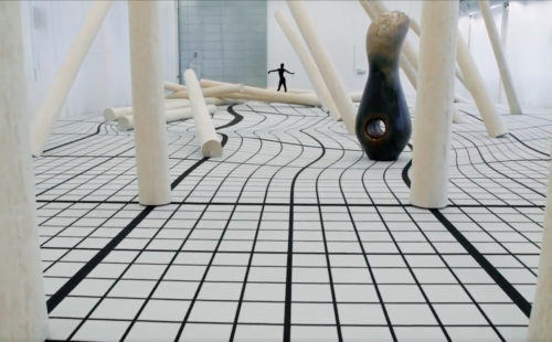 Kiani Del Valle navigates Claudia Comte’s felled forest installation in I Have Grown Taller from Standing with Trees